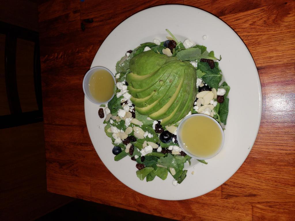 Citrus Kale Salad · Kale, Avocado, Blueberries, Raisins, Feta, Almonds with a lemon olive oil dressing.