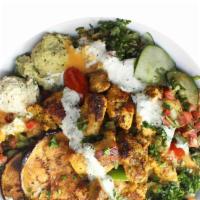Chef Recommended Bowl · spinach, white basmati rice, chicken kebab, baba ganoush, caramelized eggplant, cilantro hum...