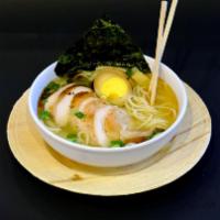 Peruvian Ramen · Roasted hen, boiled eggs, noodles, scallions, bamboo shoots and seaweed nori.