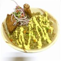 Arroz con Pollo · Chicken leg confit, cilantro green rice, green peas, carrots, and corn served with huancaina...