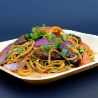 Tallarines · Fried noodles. Served with red onion, Roma tomatoes, green onions and seasons veggies.