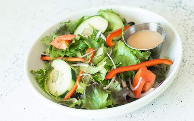 House Salad · Lettuce mix, tomato, cucumber, red pepper, red onion, with red wine vinaigrette.