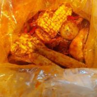 Crab Lover Combo · Includes 1 lb shrimps, 1 lb crawfish, 2 corns, 2 potatoes and 5 pieces sausages.