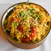 Vegetable Biryani · Basmati rice cooked with fresh vegetables, saffron and mild spices and is garnished with rai...