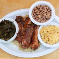 BBQ Ribs · Served with rice and choice of 2 sides.