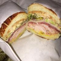 The Godfather Sandwich · Pepper salami, pepper turkey, provolone and remoulade on Dutch crunch.