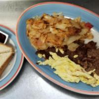 Corned Beef Hash and Eggs · Served with potatoes and toast. Made with fresh country eggs.