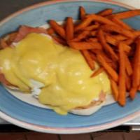 Nova Benedict · Toasted English muffin topped with nova salmon. poached eggs and hollandaise sauce served wi...