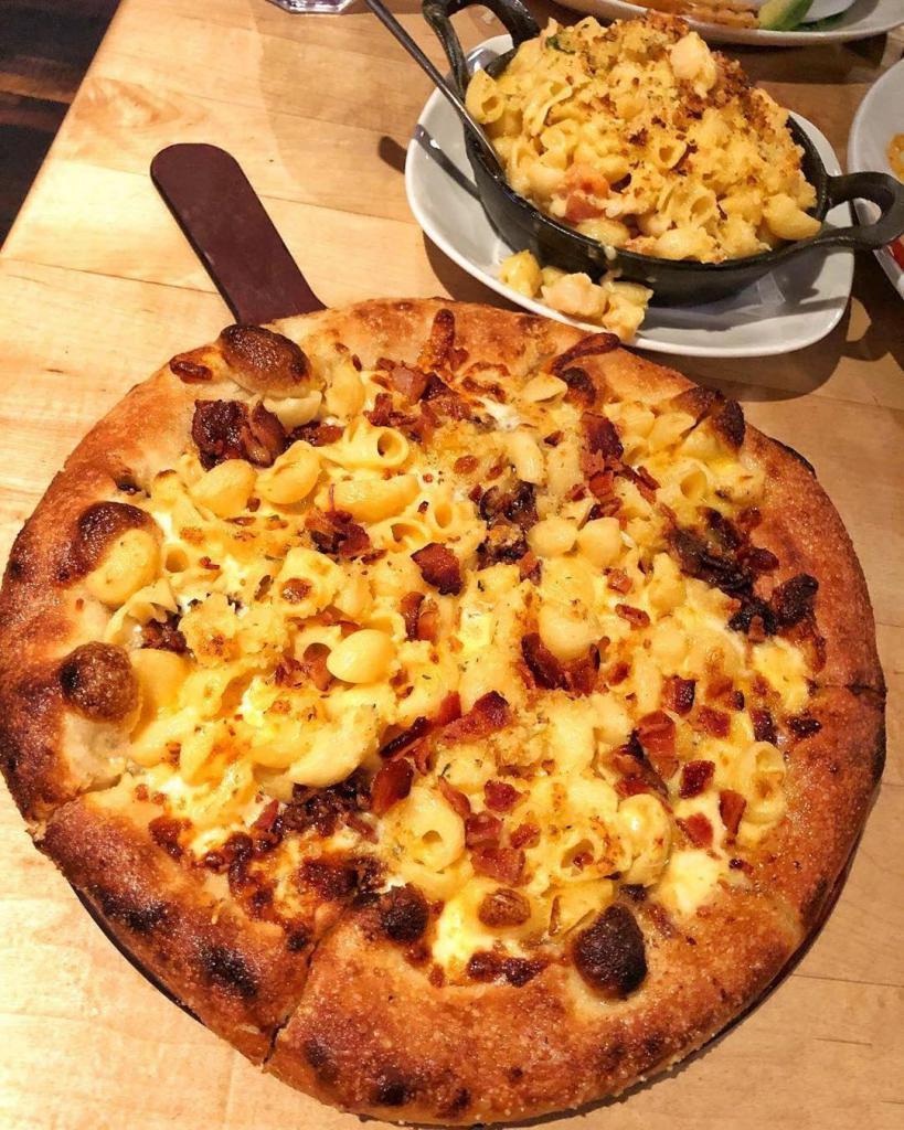 Mac n' Cheese Pizza · Mac 'n cheese, mozzarella, bleu cheese, topped with crisp Applewood smoked bacon and Italian breadcrumbs.