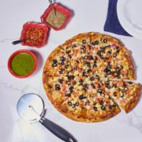 Greek Sheek Pizza · Tomatoes, red onions, black olives, feta cheese and seasoning on house walnut pesto base. Co...