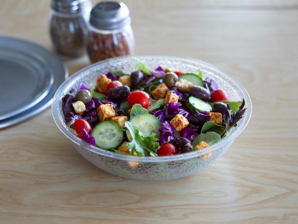 Spring Mix Salad · Organic mixed greens, cherry tomatoes, cucumbers, red cabbage and mediterranean olive-mix.