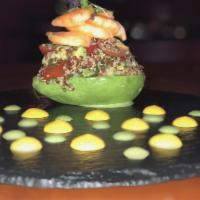 5. Palta Rellena · Stuffed avocado with shrimp, quinoa, cucumber, red pepper, mint, olive oil, cherry and tomat...