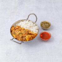Chicken Vindaloo · Chicken cooked in three light gravy, mild or hot. Served with rice and chutneys. 