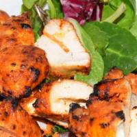 Chicken Salad · Chicken breast and mixed greens, served with balsamic vinegar-lemon-olive oil dressing on th...