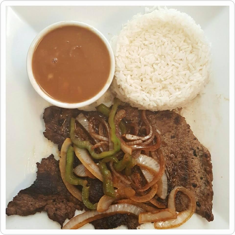 Bistec Encebollado · Steak and onions. Choice of side: White Rice and Beans, Fried Plantains, Sweet Plantains, French Fries or Steamed Vegetables