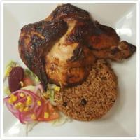 1/2 Pollo a la Brasa · Half a roasted chicken. Choice of side: White Rice and Beans, Fried Plantains, Sweet Plantai...