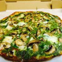 Pesto Spinach Pizza · Pesto and red sauce, double spinach, roasted garlic.