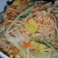 Spicy Mango Salad · Crabsticks, tobiko, avocado, cucumbers, and mangoes mixed with spicy mayo dressing and toppe...