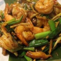50. Kratiem Prik Thai · Garlic shrimp with shitake mushrooms, scallions and bamboo shoots. Served with rice.