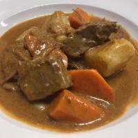 Massamun Curry Beef · Flank steak, potato, carrot, onion, peanut and cinnamon tamarind coconut curry.