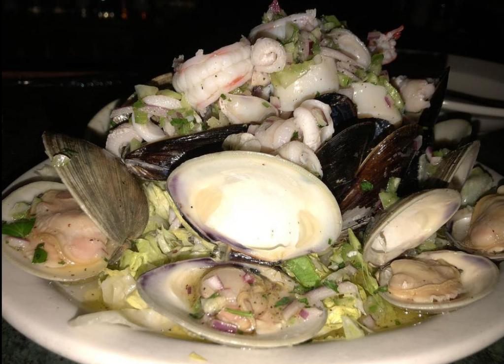 Seafood Salad · Cold seafood salad. clams, mussels, shrimp and calamari. 