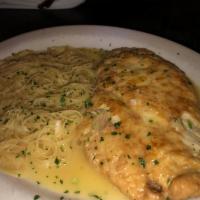 Chicken Francese · Floured & sauteed in Lemon, white wine & butter. 
Served with Pasta made in house sauce. 