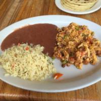 23. Carne Asada con Huevos y Arroz · Served with rice and beans or casamiento. Add plantanos for an additional charge.