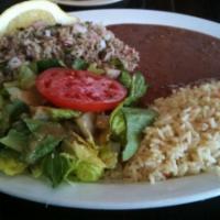 9. Salpicon, Arroz y Frijoles · Chopped beef with mint, radishes, onions, with rice, beans and salad.