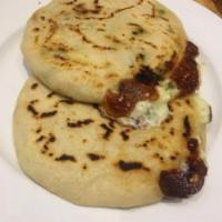 2. Mexicana y Queso Specialty Pupusa · Ground pork, jalapenos and cheese.