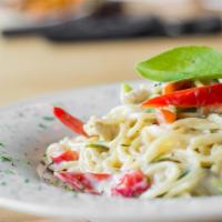 Basil Alfredo Pasta · Spaghetti, chicken and bell peppers cooked in special Alfredo basil sauce.