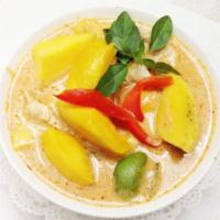 58. Mango Chicken Curry · Mango cubes, sliced chicken breast, bell pepper, pea, carrot, green bean and basil leaves, s...