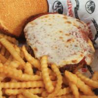 Chicken Parmigiana Sandwich · Breaded chicken breast baked with marinara sauce and mozzarella cheese on top.