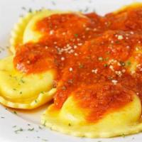 Four Cheese Ravioli · Ravioli with marinara sauce stuffed with ricotta, parmesan, asiago & romano cheeses, topped ...