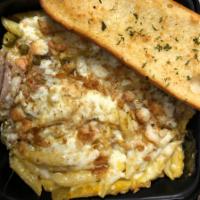 Loaded Mac & Cheese · Penne pasta smothered in a cheesy sauce blend, loaded with Italian Beef, crispy bacon, hot g...