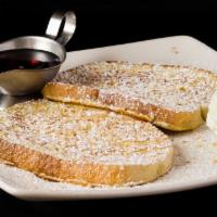 French Toast · Served with maple or chocolate syrup. Topped with powdered sugar and chopped walnuts.