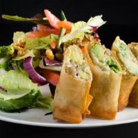 Avocado Eggroll · 2 Eggroll filled with avocado, feta cheese and purple onion Served with a small salad.