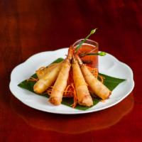 Royal Shrimp · Marinated jumbo shrimp wrapped in wonton, served with Thai sweet chili sauce.