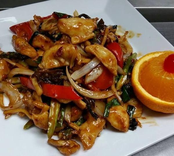 Yushan Chicken · Chicken stir fried with bell peppers, woodear, onion and scallion. Bamboo shoots asparagus in hot garlic sauce. Served with rice. Hot and spicy.