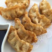 Vegetable dumplings (7 pcs) · crispy dumplings deep fried with ginger dipping soy sauce