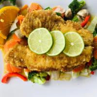 Lemon Tilapia                             · Crispy tilapia, steam mixed vegetables, lemon sweet and spicy sauce on the side. (mild spicy...