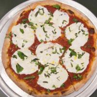 9. Margherita Pizza · Homemade mozzarella, fresh basil and a drizzle of extra virgin olive oil.