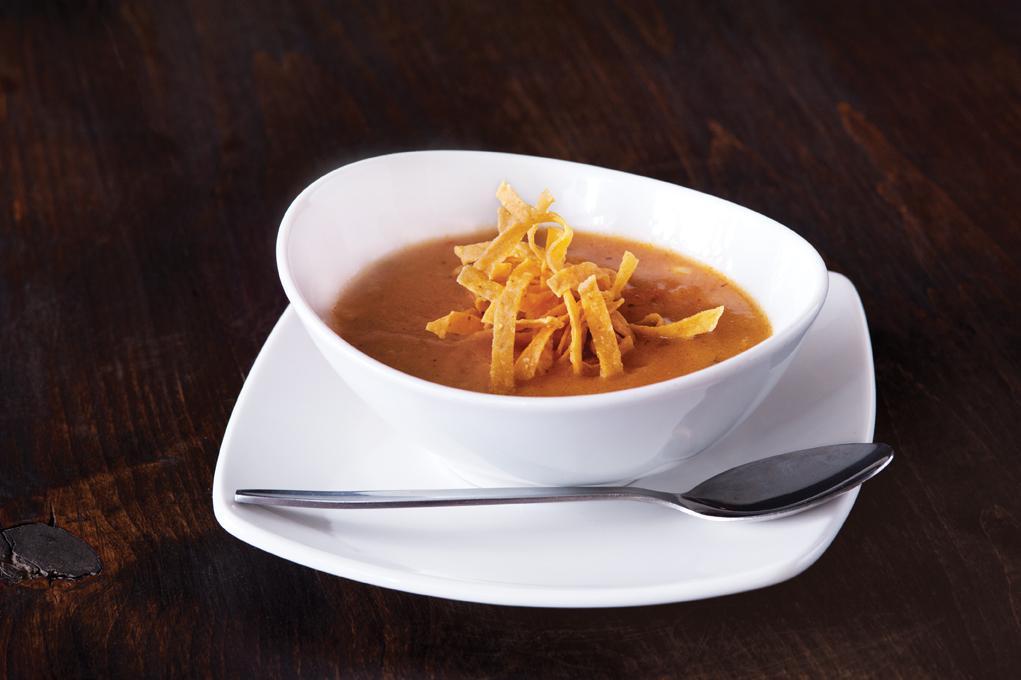 Sedona Tortilla Soup  · Vine-ripened tomatoes, tomatillos and corn with mild green chilies, Southwestern spices and crispy corn tortilla strips. Vegetarian.