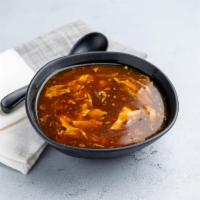 Hot and Sour Soup · A traditional Chinese soup with broth, eggs, tofu and vegetables. Spicy.