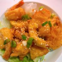 Orange Shrimp · Deep fried battered shrimp stir-fried with fresh orange sauce and topped with green onion an...