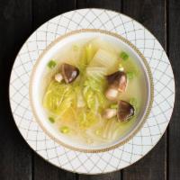 S3. Clear Soup · The clear vegetable broth comes with napa, vermicelli and mushroom. Vegan.