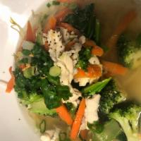 E13. Noodle Soup · Thin rice noodle with Chinese broccoli, broccoli, carrot, bean sprouts, in veggie broth. Veg...