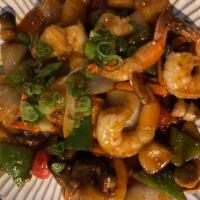 E26. Sweet 'N' Sour · Sauteed garlic, onion, bell pepper, carrot, mushroom, scallion, pineapple and tomatoes in sp...