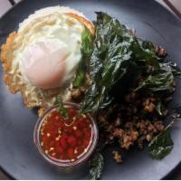 E29. Basil Ground Pork with Fried Egg · Sauteed ground pork, basil, chili, garlic, onion, string bean, bell pepper over rice topped ...