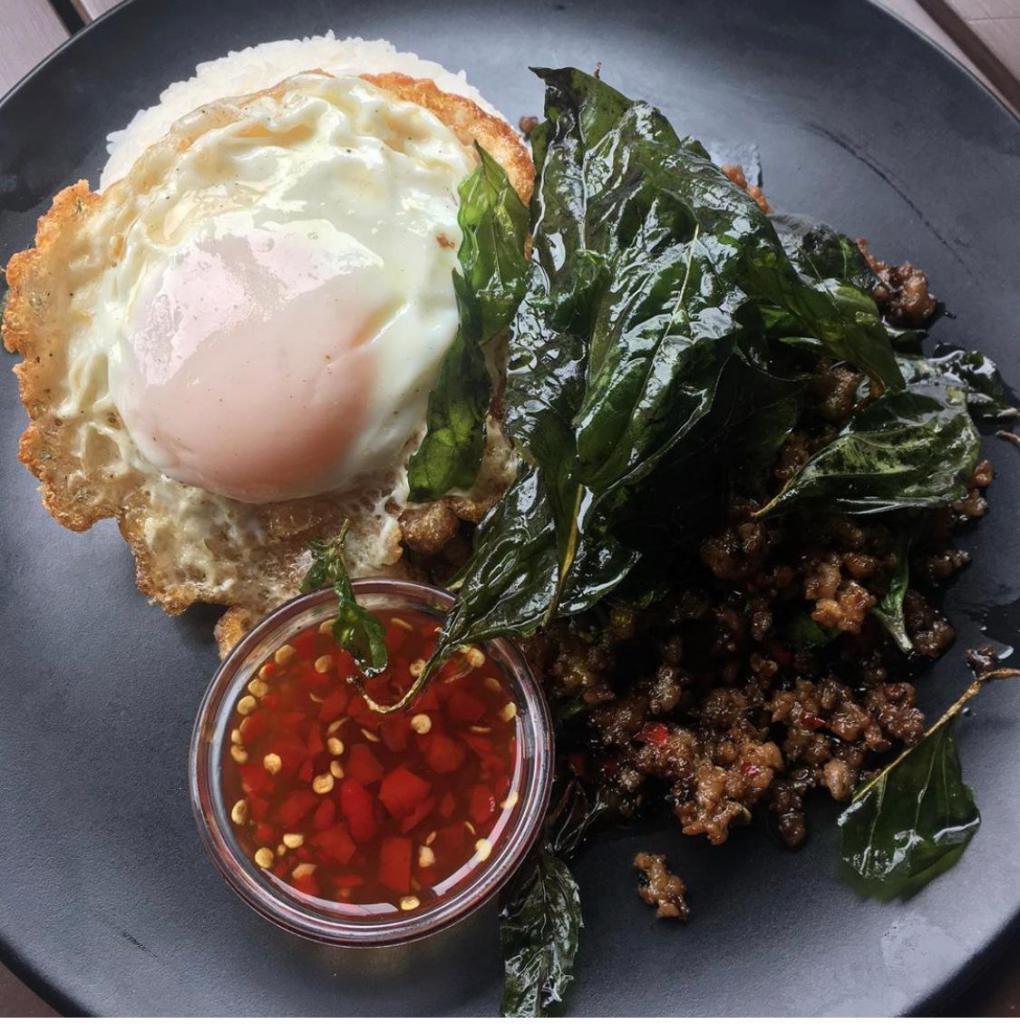 E29. Basil Ground Pork with Fried Egg · Sauteed ground pork, basil, chili, garlic, onion, string bean, bell pepper over rice topped with a fried egg. Spicy.