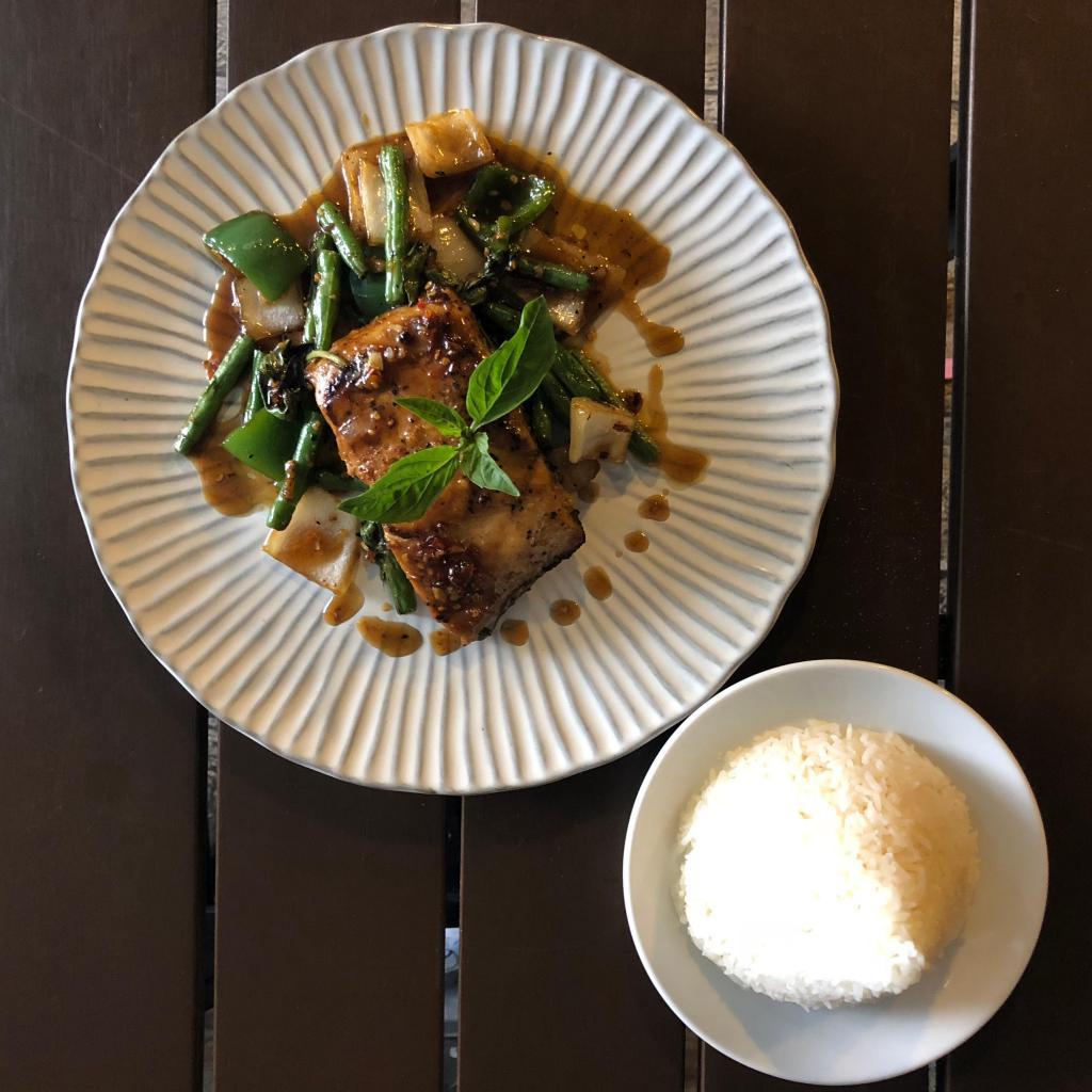 Grilled Salmon Basil Sauce · Basil not avialable Sauteed Thai Chili, garlic, string bean, onion, bell pepper topped on marinated grilled salmon served with Jasmine rice